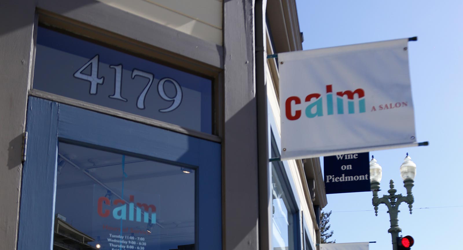 Calm, a Salon - front door and sign/shingle