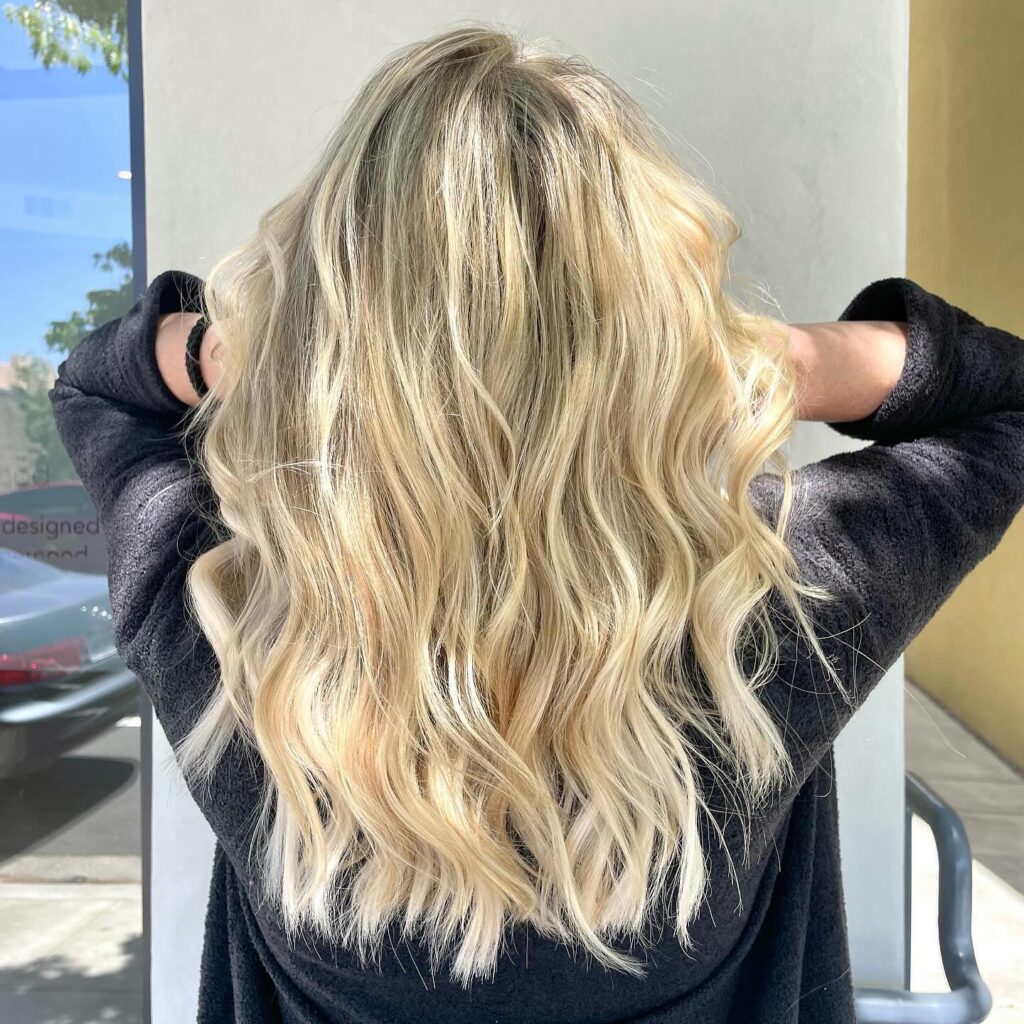 long curly blonde hair from back